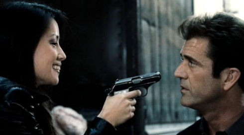 Lucy Alexis Liu und Mel Gibson in «Payback»